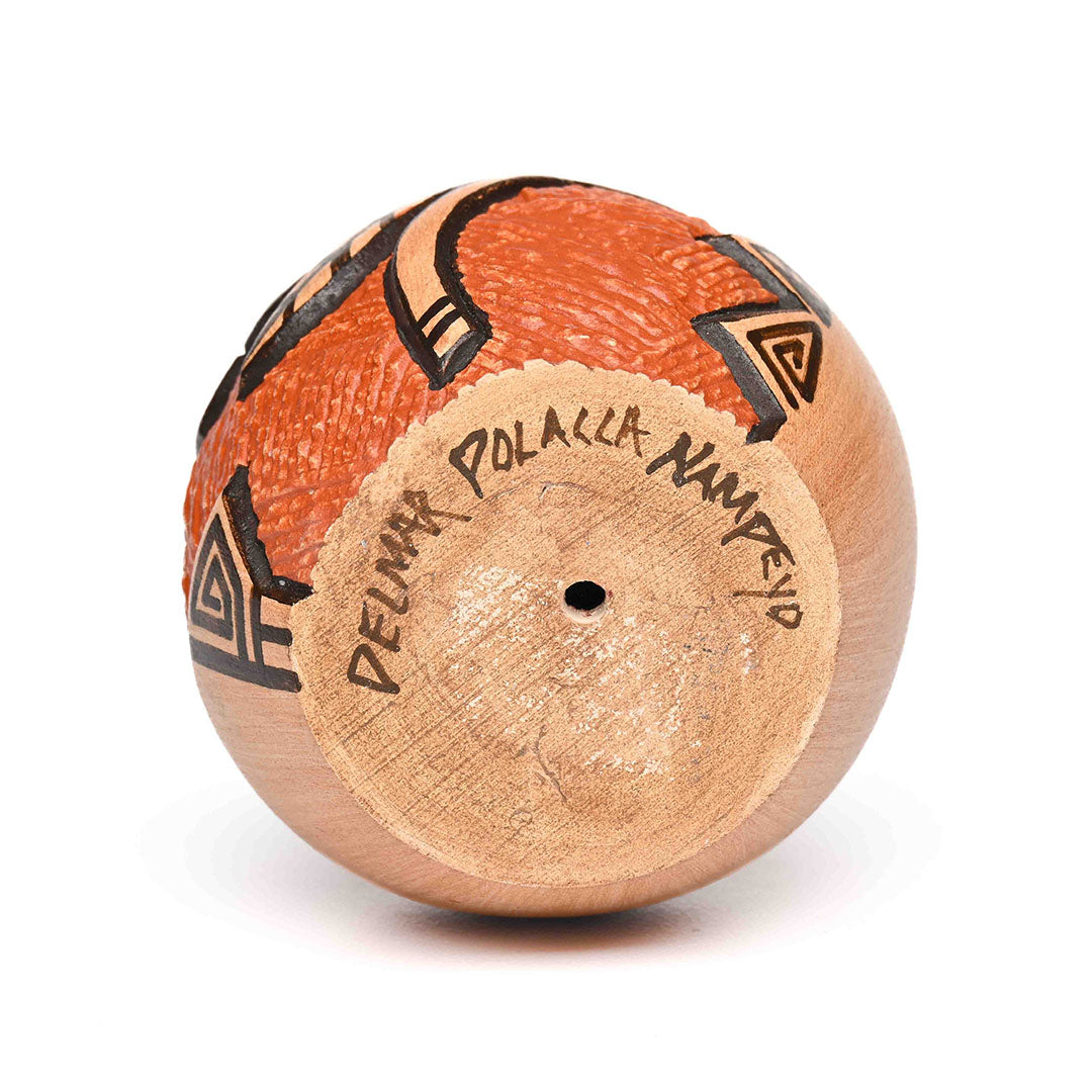 Hand-Coiled Seed Pot with the incised image of a flower