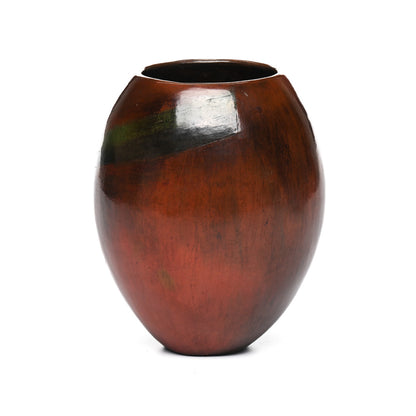 Hand-coiled Navajo pot with Pinon pitch finish