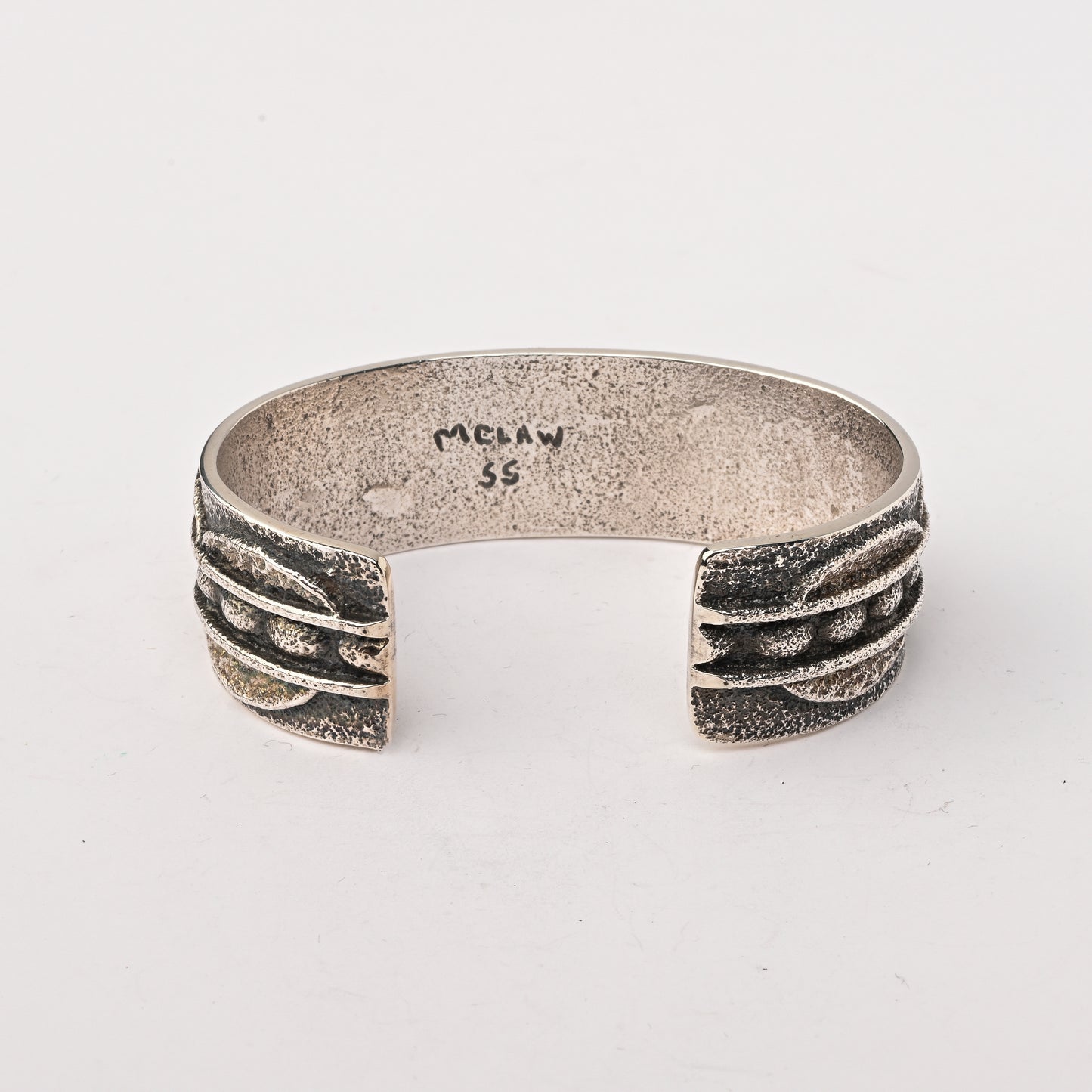 Sterling silver, Tufa-cast Cuff Bracelet set with a single Turquoise Stone