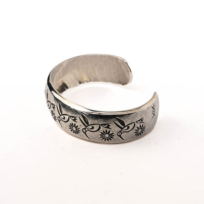 Sterling Silver Cuff Bracelet with Stamped Images of Hummigbirds
