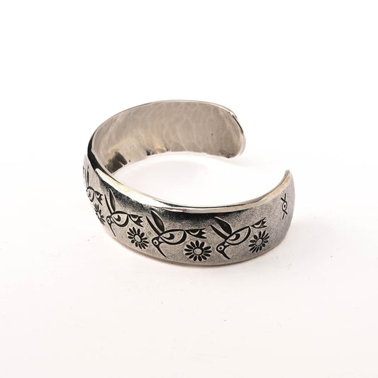 Sterling Silver Cuff Bracelet with Stamped Images of Hummigbirds