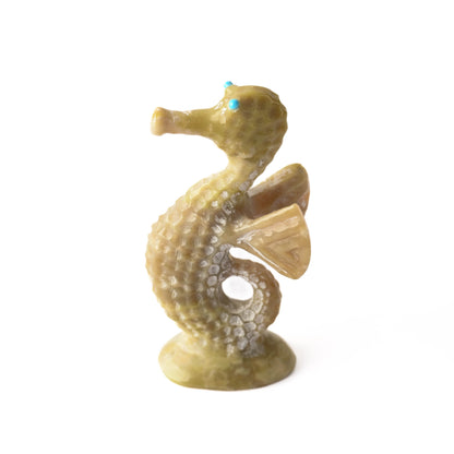 Seahorse fetish with turquoise eyes