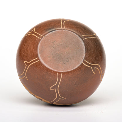 Hand coiled and carved pot from Santa Clara Pueblo