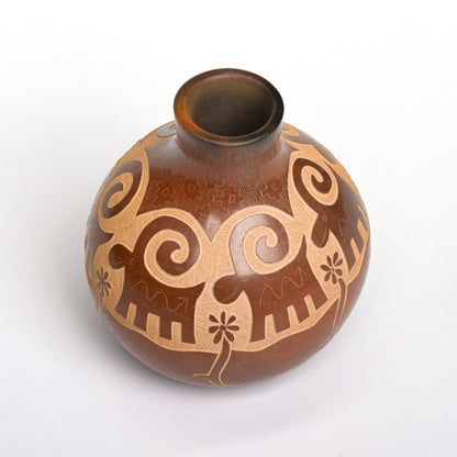 Hand coiled and carved pot from Santa Clara Pueblo